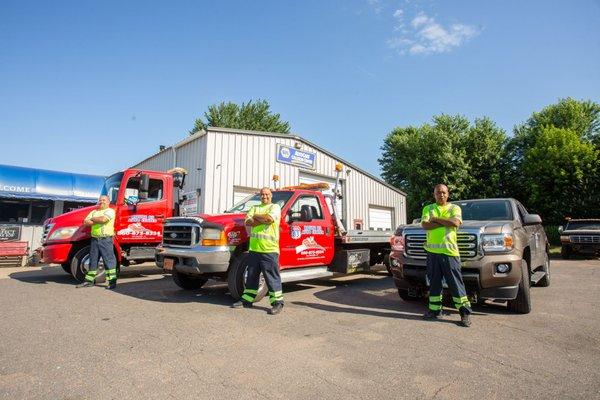 Here's our tow crew! We tow everything from medium duty vehicles to motorcycles. Call our 24-hour service line for assistance!