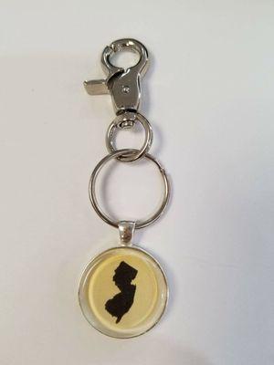 If you love the Jersey Shore, you will love this New Jersey Key Chains. Locally Made with real Garden State parkway Tokens.