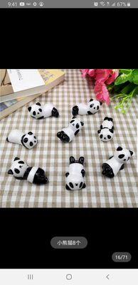 More panda chopstick holders in different poses.