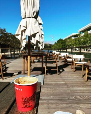 Enjoying a cup of Cappuccino on the dock.