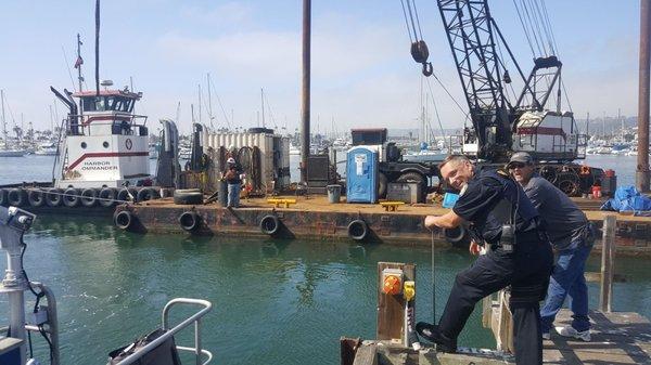 police divers helped recover sunken items ,and removed them from the bay