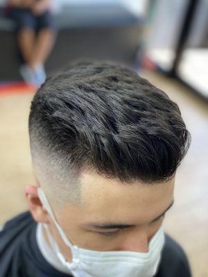 Top view,High skinned fade & trimmed top for this fella