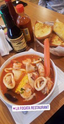 Arroz Marinero. I highly recommend if you love seafood. The broth is delicious. Perfect for a hangover lol