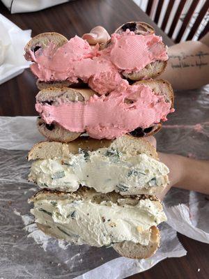 Strawberry cream cheese on blueberry bagel & scallion cream cheese on everything bagel