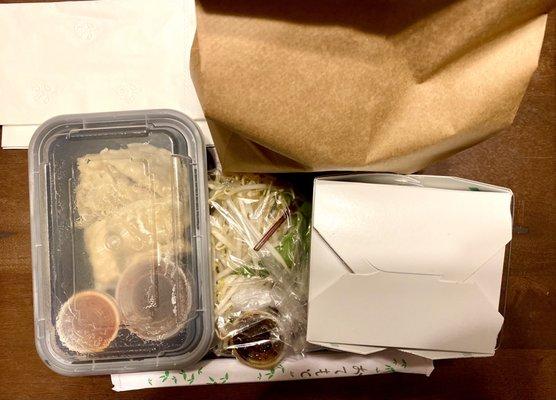 Pho Boston and dumplings takeout packaging