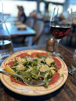 TEXAS WAGYU BEEF CARPACCIO dijonnaise, arugula, parmigiano, pine nuts