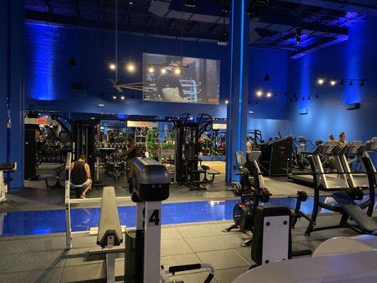 The gym floor from the side showing huge 16 foot screen