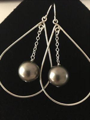 Custom made earrings from my trip pearls