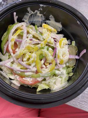 My shitty salad with no cheese that I ordered. Barely any lettuce