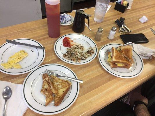 Yum yum yum Eggs, French toast, hash browns, egg sammich