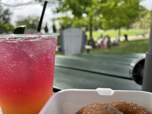 A cocktail and doughnuts!