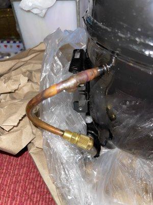 Process tube Schrader valve installed. New does not come with one