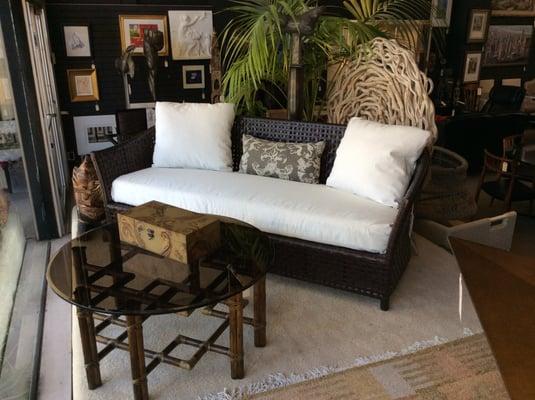 McGuire Atalya Sofa with cushion - $1199 McGuire Round Cocktail Table Tobacco - $499