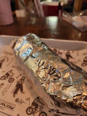 I love it when they wrap it up, and I pull the foil down to reveal the burrito for the first bite