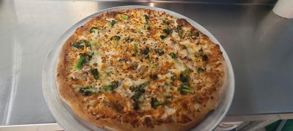 KJ's Chicken broccoli Alfredo Pizza.