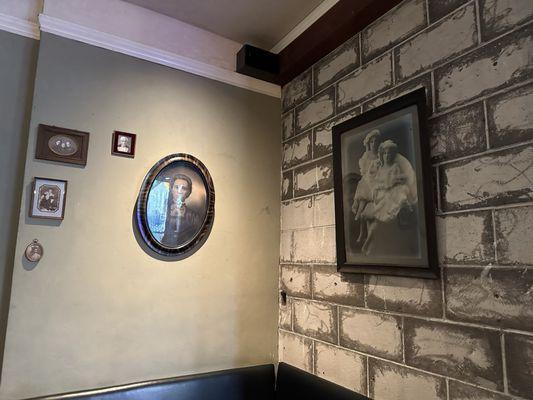 Old time-y photos and real exposed bricks contribute to Speakeasy ambiance