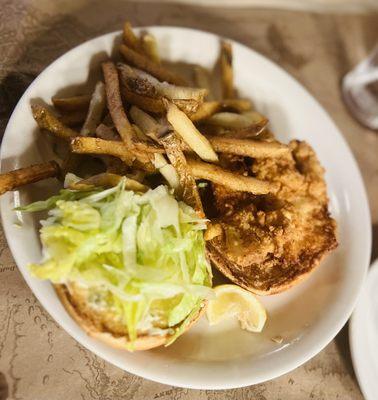 This fish sandwich may not look the best but it is absolutely flavorful and delicious with fresh cut fries to match.