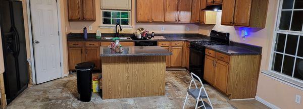 Original cabinets that were unmatchable so insurance paid enough to have them all replaced.