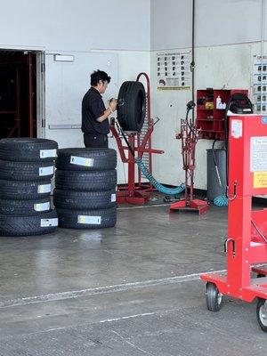 The hardworking mechanic fixing the hole