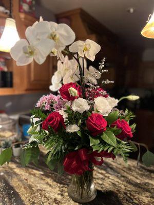 Orchid and rose bouquet