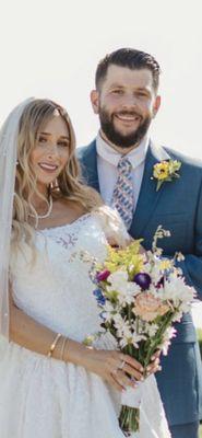 Beautiful flowers and boutonniere she handmade