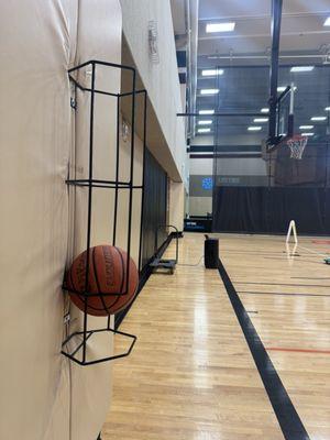 Smart container for basketballs, right there in the gym