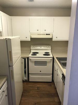 Small kitchen... to the left is a small window. Double sink. Microwave was left from previous resident so I left it for the next person.