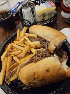 Philly cheese steak with fries. Done the way Phillies eat it - with Cheez Whiz