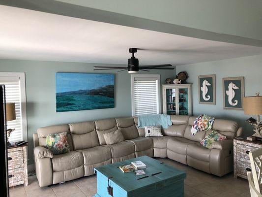 Here is the table in our beach house. It complements the colors. It's a treasure trove for all sorts of toys. Room for baskets.