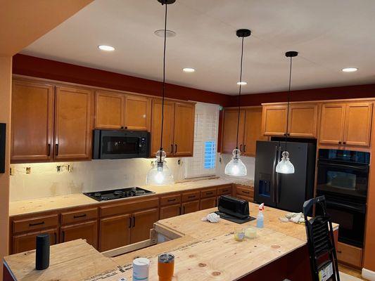 Revitalize your space! Check out these kitchen cabinets before our expert painting service.