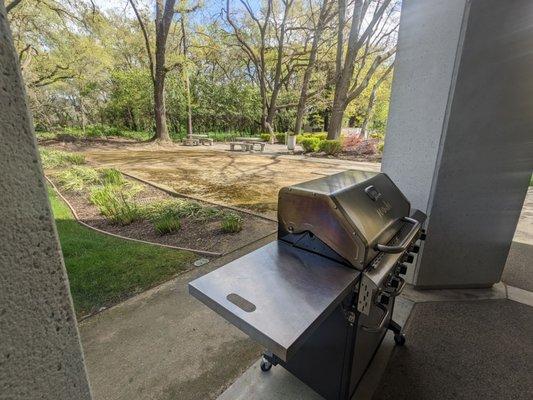 Grill and outdoor seating.