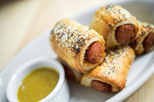 Our Hoyt Dogs in Blankets: All beef franks, served with maple mustard