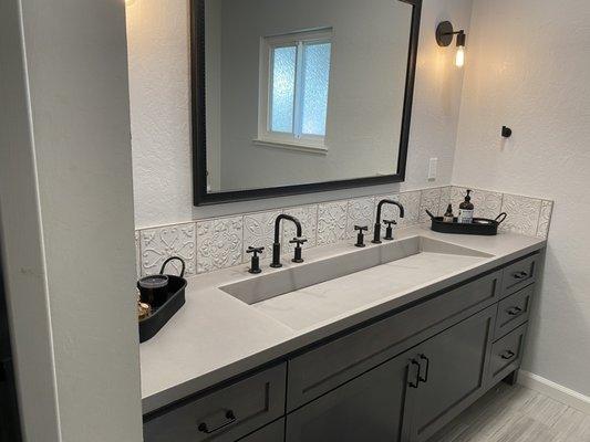 Long ramp sink and vanity