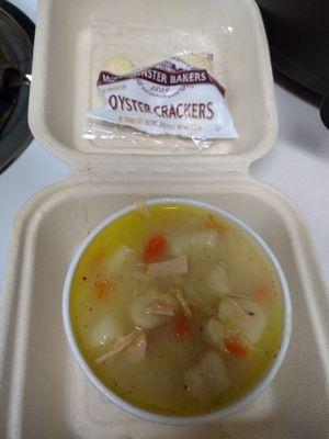 Chicken and dumplings with packet of oyster crackers