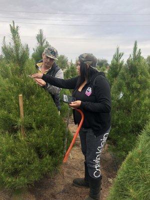 Daughter and son-in-law picking out the tree!