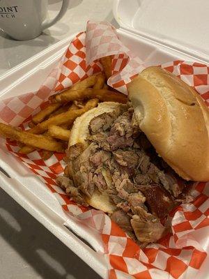 Hog sandwich with fries