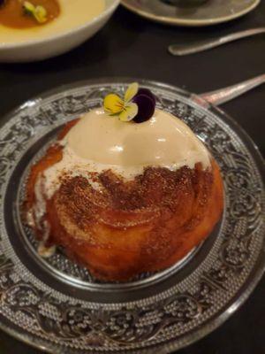 Churro round with a dollop of cinnamon icecream