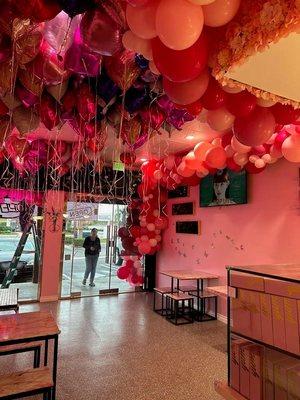 Grand opening balloons inside