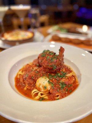 Tagliatelle all' Aragosta Homemade tagliatelle pasta, Maine Lobster tail, shrimp, scallops in fresh tomato sauce