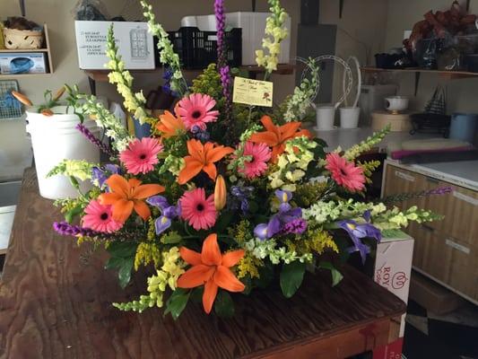 Mix basket featuring gerber daisys.