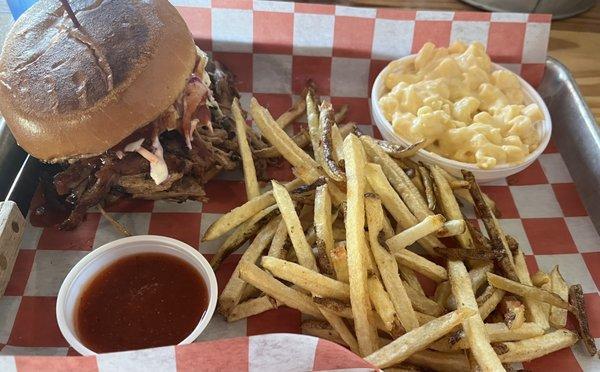 Pulled Pork Sandwich with Mac & Cheese and a said of Fries