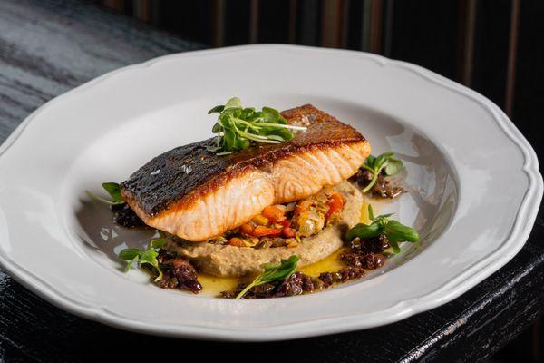 ROASTED ATLANTIC SALMON 

roasted summer squash, sweet & sour eggplant, black
olive caper vinaigrette, micro arugula, pine nuts