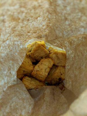 Fried tofu. You know it's good when it's served in a paper bag...lol