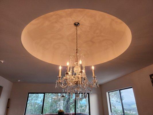 Solution: creation of a dome to allow for chandelier to hang at correct height.