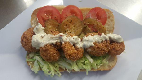 Shrimp Po'boy - crispy shrimp, tomato, pickles, lettuce, remoulade