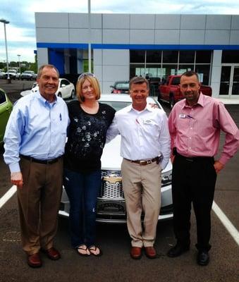 Taking delivery of our new Chevy Cruze, Allan, my wife Nicole, Larry and Michael