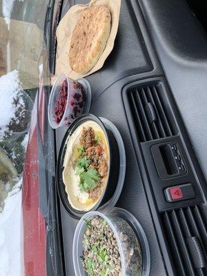 Delicious Dizenlunch in the car.(beef hummus and lentils on the side)