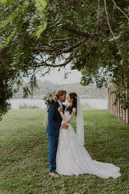 Beautiful couple after lakefront wedding.