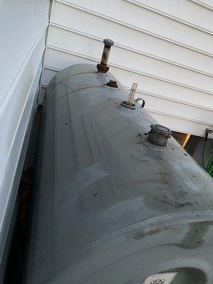 Heating oil spilled on our oil tank and house by Petro