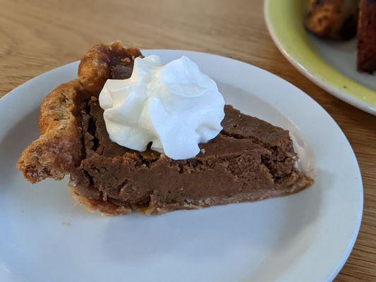 brown butter pumpkin pie with whipped cream